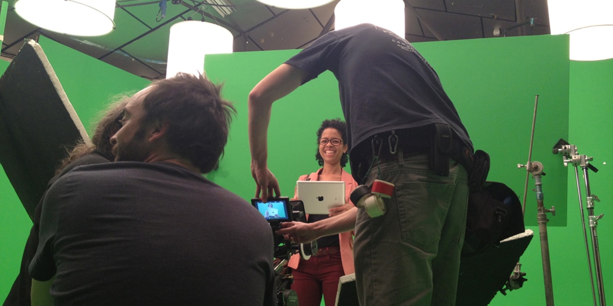 Filming actress on chroma studio