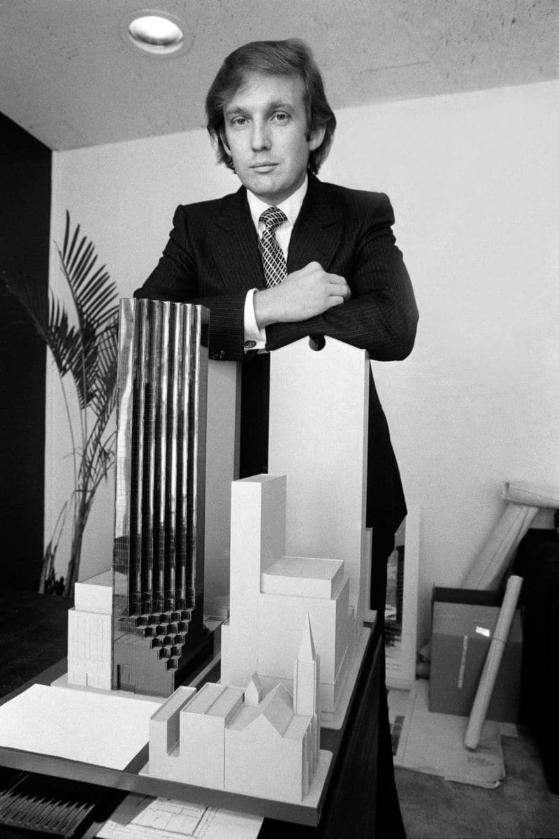 Trump with the Trump Tower model