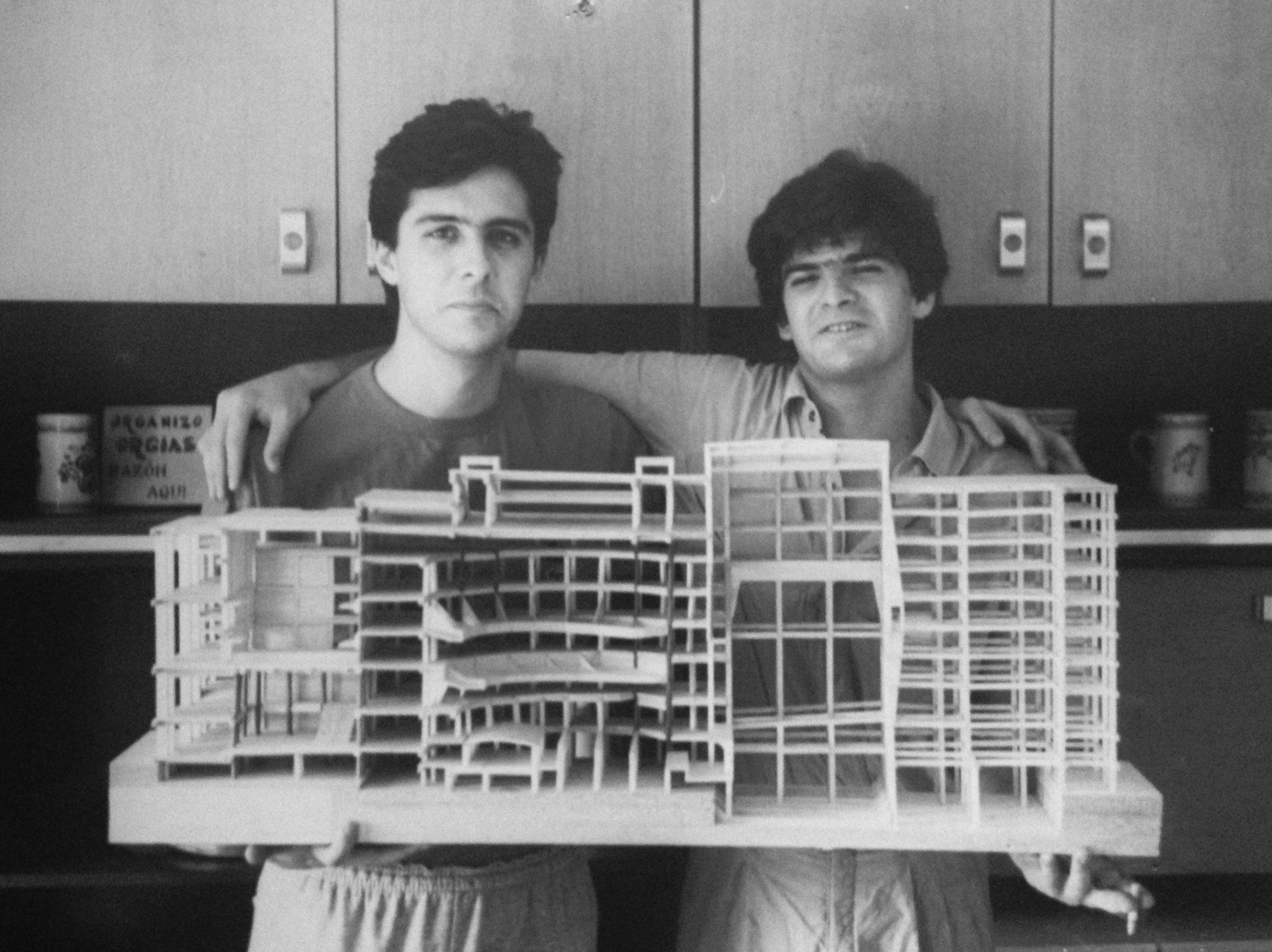 Juan Gayarre and Carlos Tejada with an architectural model on their hands